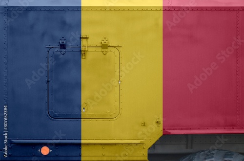 Chad flag depicted on side part of military armored truck closeup. Army forces conceptual background photo