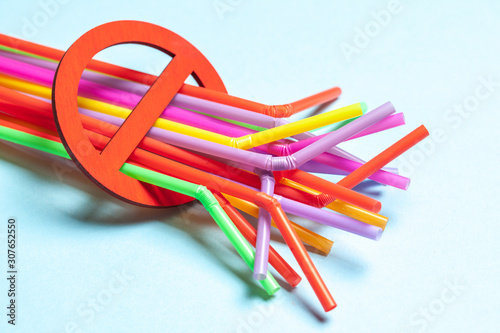 Ban on plastic straws for drinks. Prohibition sign and plastic
