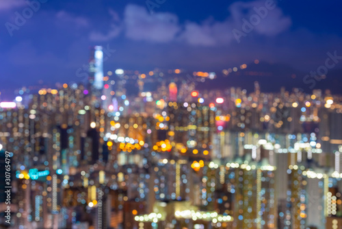 Blurred abstract background lights  beautiful cityscape view of Hong Kong city skyline at night in Hong Kong.