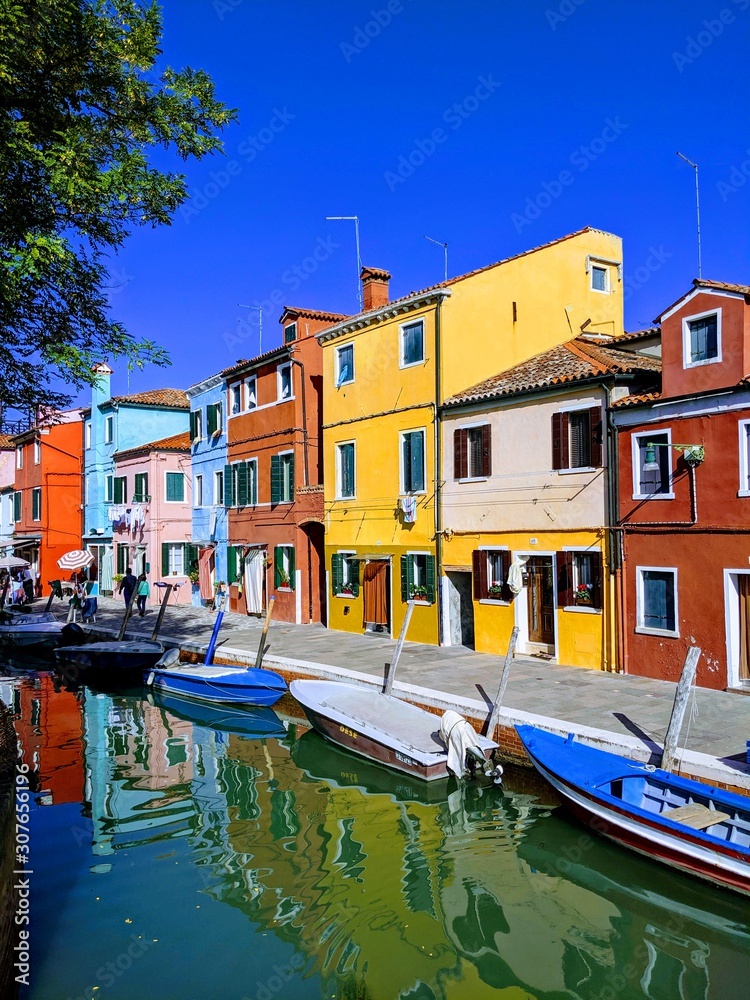 canal in burano, italy