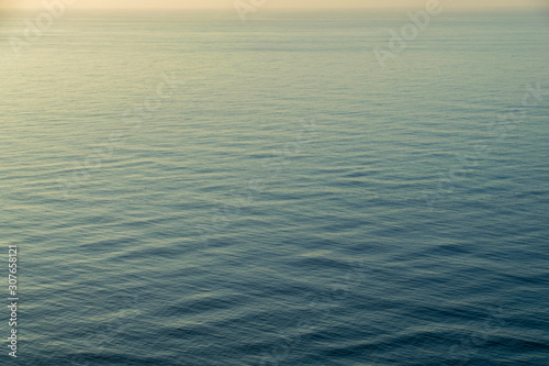 Beautiful, abstract photo of the ocean at sunset