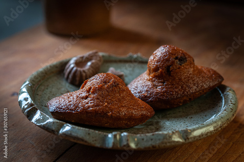 homemade chocolate madeleine cakes. photo
