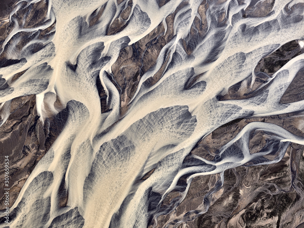 Glacial river pattern. The aerial shot was taken in Iceland from a Cessna plane Glacial river pattern. The aerial shot was taken in Iceland from a Cessna plane