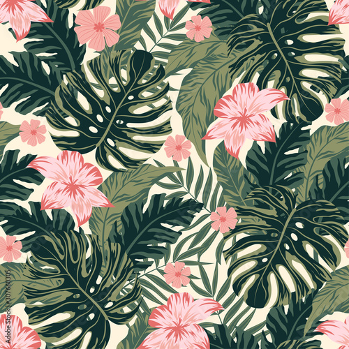 Beautiful tropical seamless pattern with plants and leaves and delicate flowers. Vector background for various surface.  Trendy summer Hawaii print.  Floral pattern. Jungle leaves. Botanical pattern.
