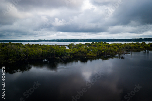 The mouth of the Ja   River is within the Ja   National Park and houses great biodiversity of the Amazon biome. amazonas  Brazil