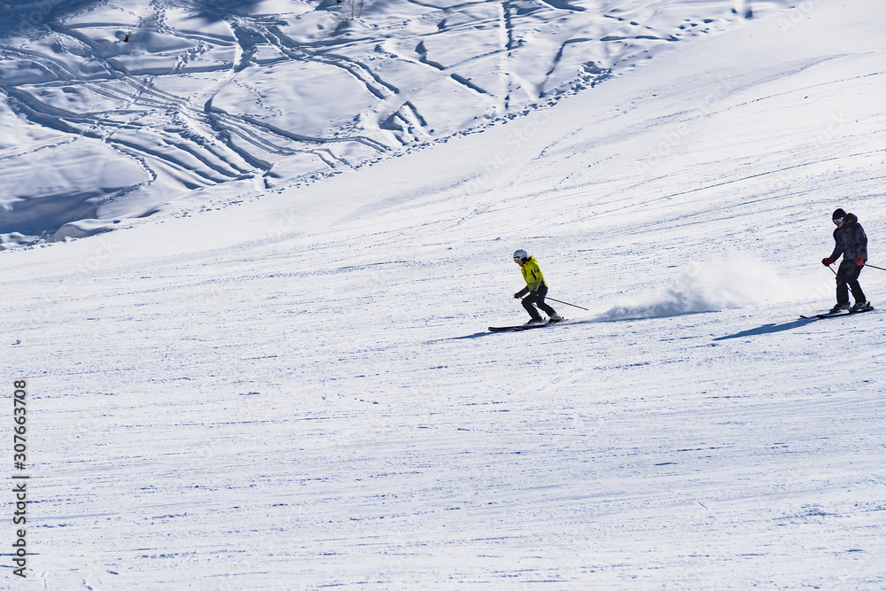 skier going down the mountain