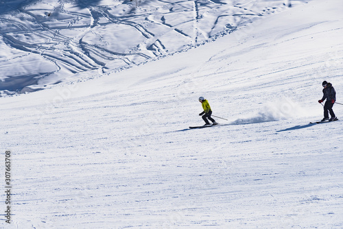 skier going down the mountain