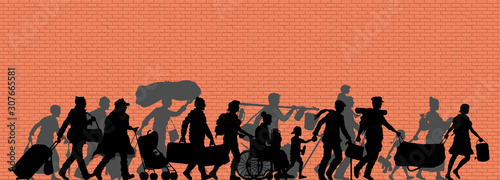Walking immigrants silhouette in front of brick wall