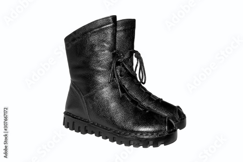 Women's leather boots on white background.Women's leather shoes side view.