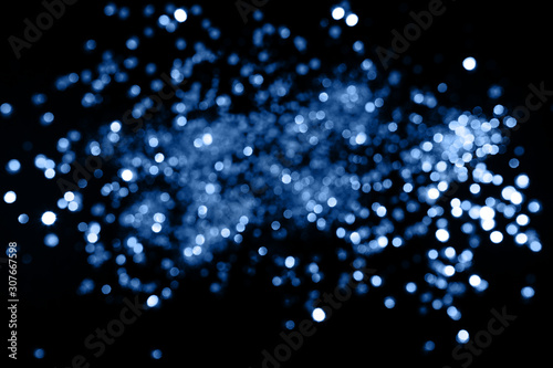 Blue sparkling abstract background. Festive concept. Color 2020 concept.