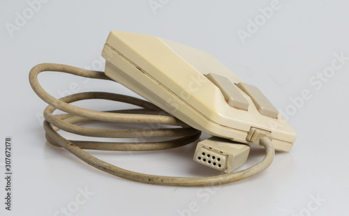 Old technology Retro Vintage computer PC desktop mouse off-colour beige very dirty, grimy, filthy old obsolete technology historic equipment technology with new mice being almost the same
