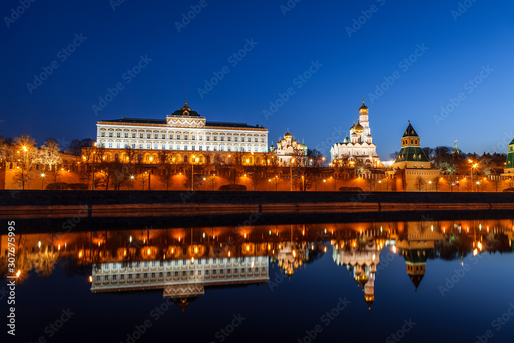 Panorama of the Moscow Kremlin in the early morning with a mirror reflection in the Moscow river, Russia Panorama of the Moscow Kremlin in the early morning with a mirror reflection in the Moscow river, Russia