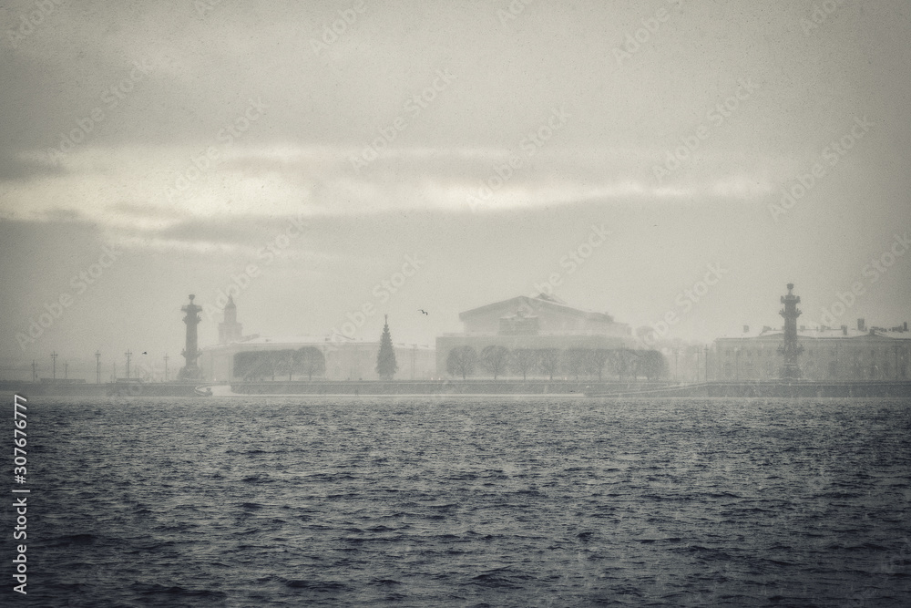 Rain and snow in the city. Vintage style winter landscape. Saint-Petersburg. Russia.