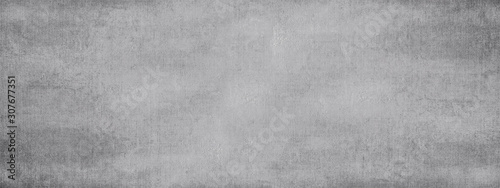 Gray old grunge texture with dark damage.Vintage background.Long wide format.