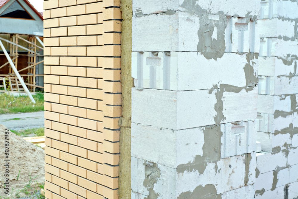 house made of foam concrete insulated with mineral wool and lined with bricks house made of foam concrete insulated with mineral wool and lined with bricks