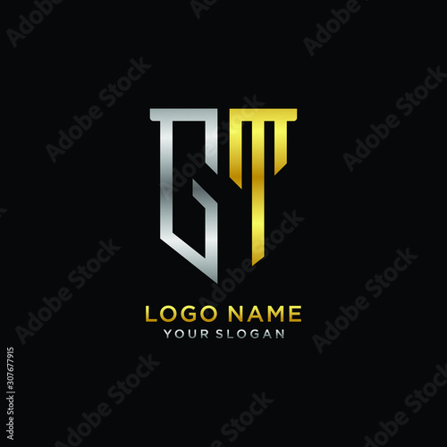 Abstract letter GT shield logo design template. Premium nominal monogram business sign.shield shape Letter Design in silver gold color