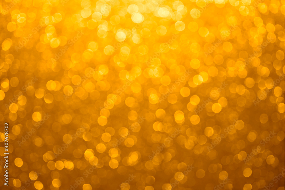 Festive golden bokeh background with sparkling glitter Festive golden bokeh background with sparkling glitter