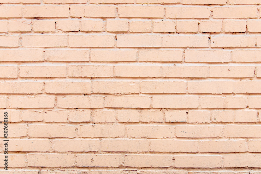 Obraz premium the brick wall is painted pink