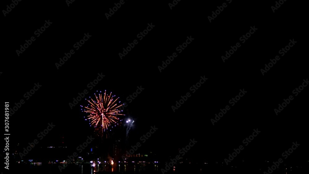 Real fireworks exploding celebration frame fill and loop seamlessly abstract blur bokeh lights in the night sky with the glowing fireworks show festival. 4K 25fps Real fireworks exploding celebration frame fill and loop seamlessly abstract blur bokeh lights in the night sky with the glowing fireworks show festival. 4K 25fps