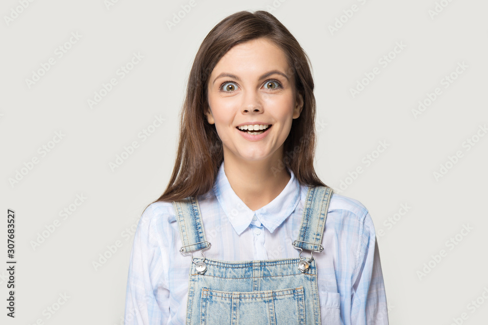 Headshot of excited happy millennial woman looking nerdy like kid Headshot of excited happy millennial woman looking nerdy like kid