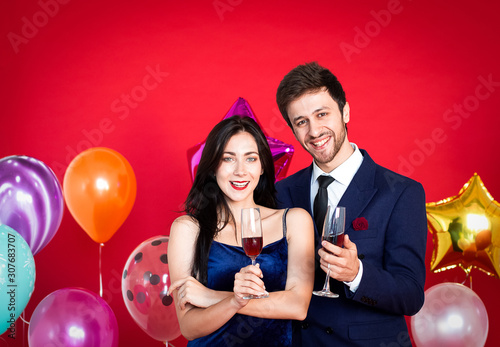 Couples are drinking to celebrate the new year festival on a red background,happy New Year