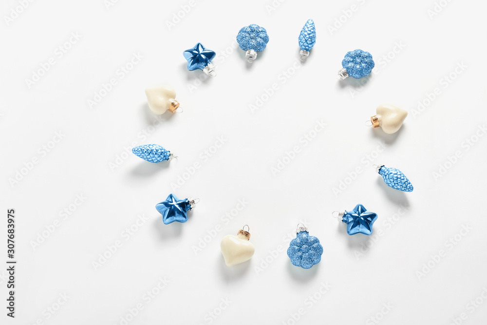 Christmas decor in the form of cone, heart and stars in blue color on a white background. new year's concept frame. flat lay, top view Christmas decor in the form of cone, heart and stars in blue color on a white background. new year's concept frame. flat lay, top view