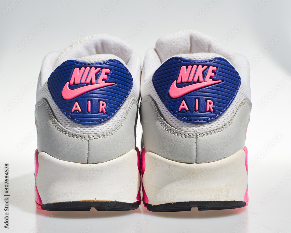 london, englabnd, 05/08/2018 Nike Air max 90s logo, White, pink, purple, Nike  air max retro classic sneaker trainers. Nike sport and street wear  fashionable athletic apparel. Stock Photo | Adobe Stock