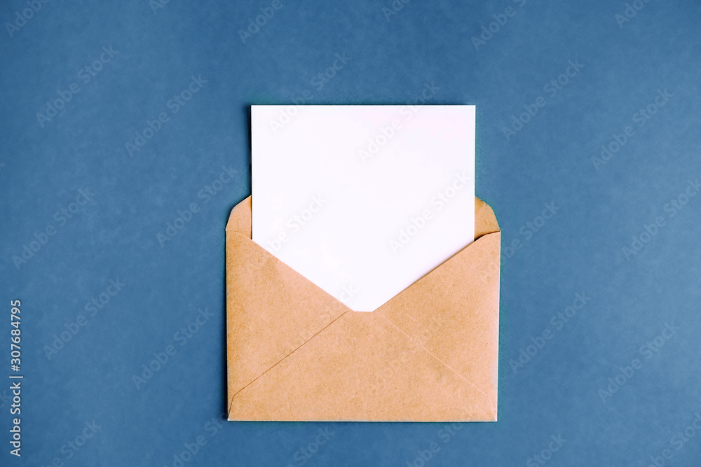 Envelopes with a white letter sheet on a blue background. Envelopes with a white letter sheet on a blue background.
