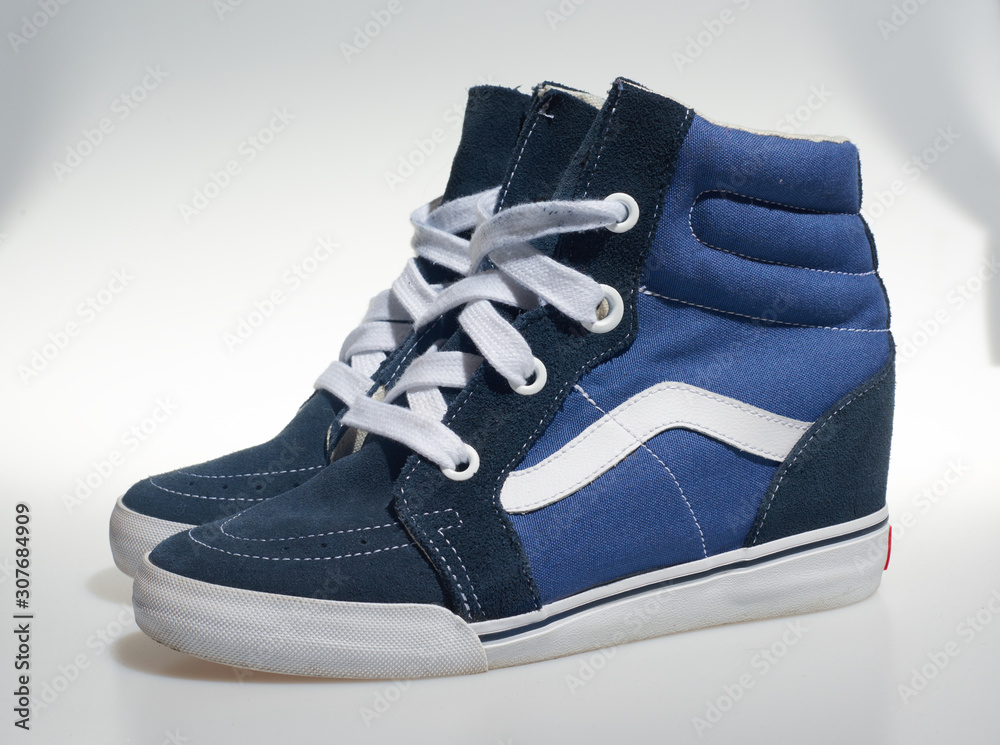 london, england, , 18/05/2019 Vans Sk8-Hi Wedge High Top Shoes marine and  white Iconic retro vintage classic fashion revival sneakers. skateboarding  culture. vans trainers. Stock Photo | Adobe Stock
