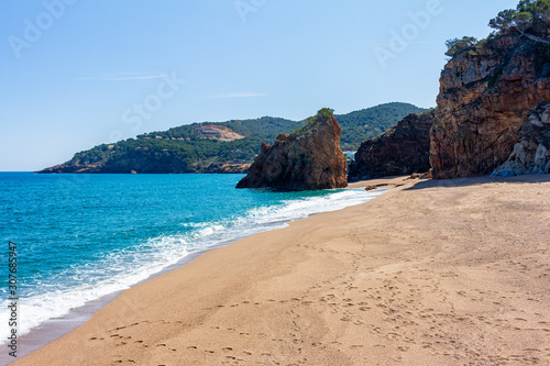 View of Moreta beach with red island in the background, Begur, Costa Brava, Catalonia, Spain