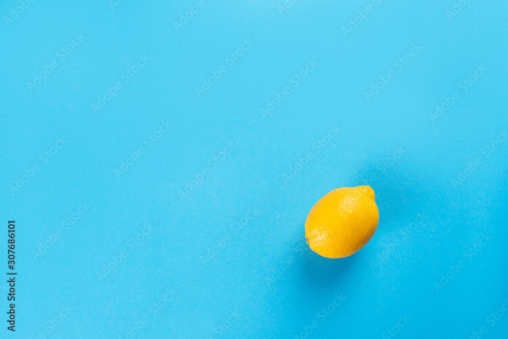 Lemon over blue background Lemon over blue background