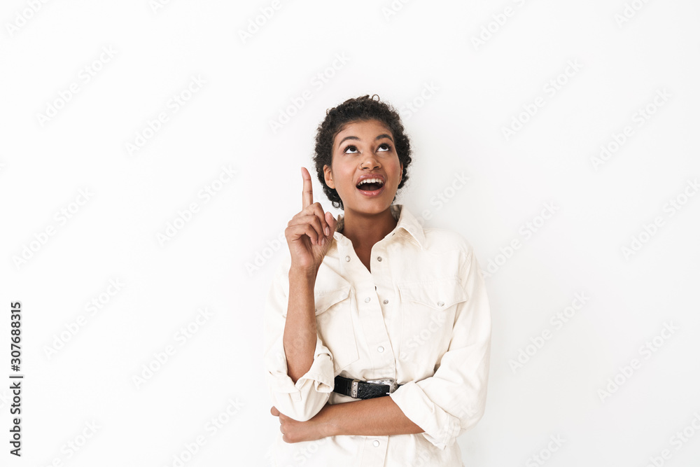 Beautiful excited stylish young african woman standing Beautiful excited stylish young african woman standing