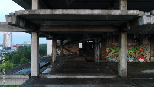 Unfinished parking. Abandoned building in the city