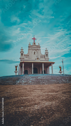 Jesus Crist Church In manapad with a Bule Sky and sand  photo