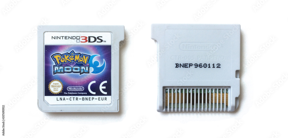 london, england, 05/05/2018 A pokemon moon nintendo 3ds handheld console  video game cartridge card. Pokemon go and pokemon video games are highly  addictive. pikachu is a character in the game. Stock Photo