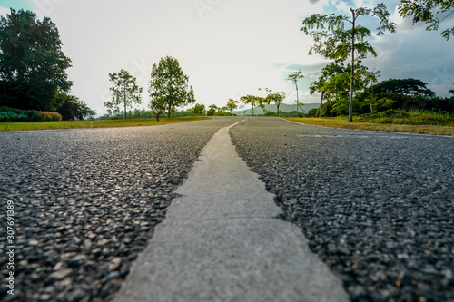 Close up of Asphalt road with white line