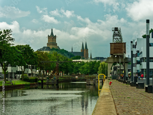 view at the Schwanenburg from the old harbour, Kleve on a cloudy day