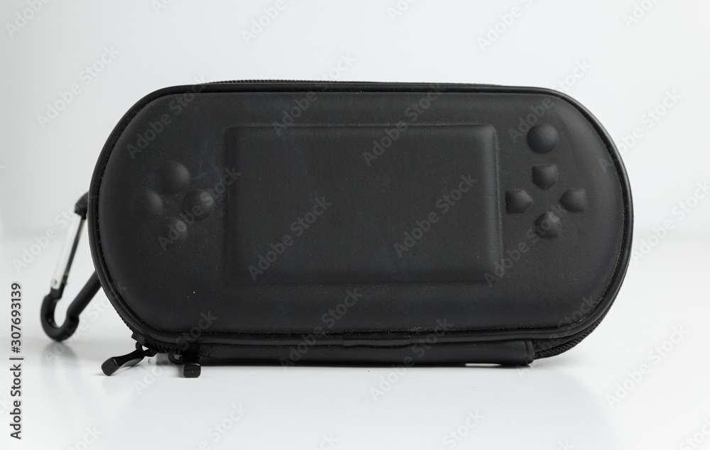 london, england, 05/05/2019 A black sony playstation psp portable games  console carry case. retro vintage gamers computer console accessories. foto  de Stock | Adobe Stock