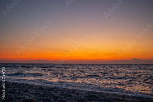 purple orange red sunset at the beach