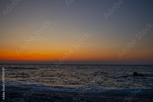 orange red sunrise at the beach © KyriaKos Kinatidis