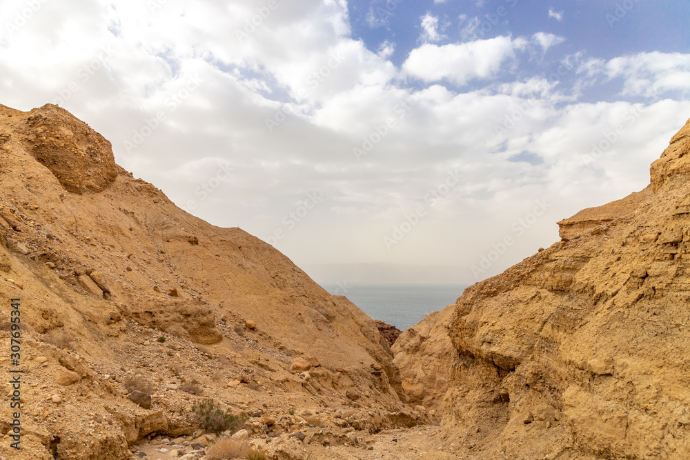 Hiking trail at the Wadi Mujib reserve. View of the Dead sea. Jordan