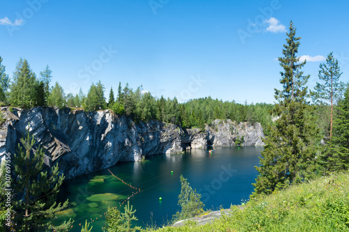 Rocks and lake of marble canyon in Ruskeala