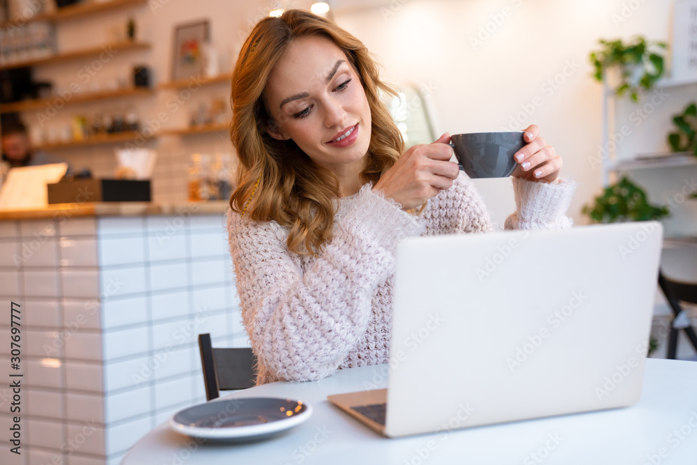 Young blonde woman sit in cafe Young blonde woman sit in cafe