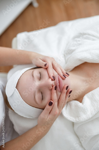 young girl in beauty salon, laser epilation and beauty