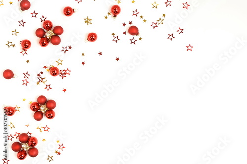 Fototapeta Naklejka Na Ścianę i Meble -  Christmas background . Xmas or new year red gold color decorations on white background with empty copy space for text.  holiday and celebration concept for postcard or invitation. top view 