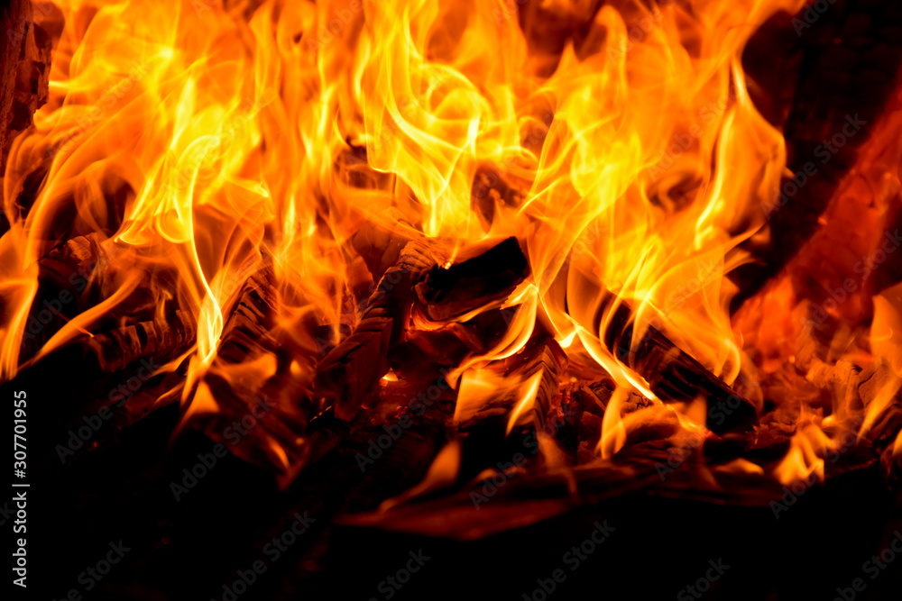 Real wood cinder charcoal burning with a fire sparks it dangerous but beautiful giving a warm and scary feeling at the same time Real wood cinder charcoal burning with a fire sparks it dangerous but beautiful giving a warm and scary feeling at the same time