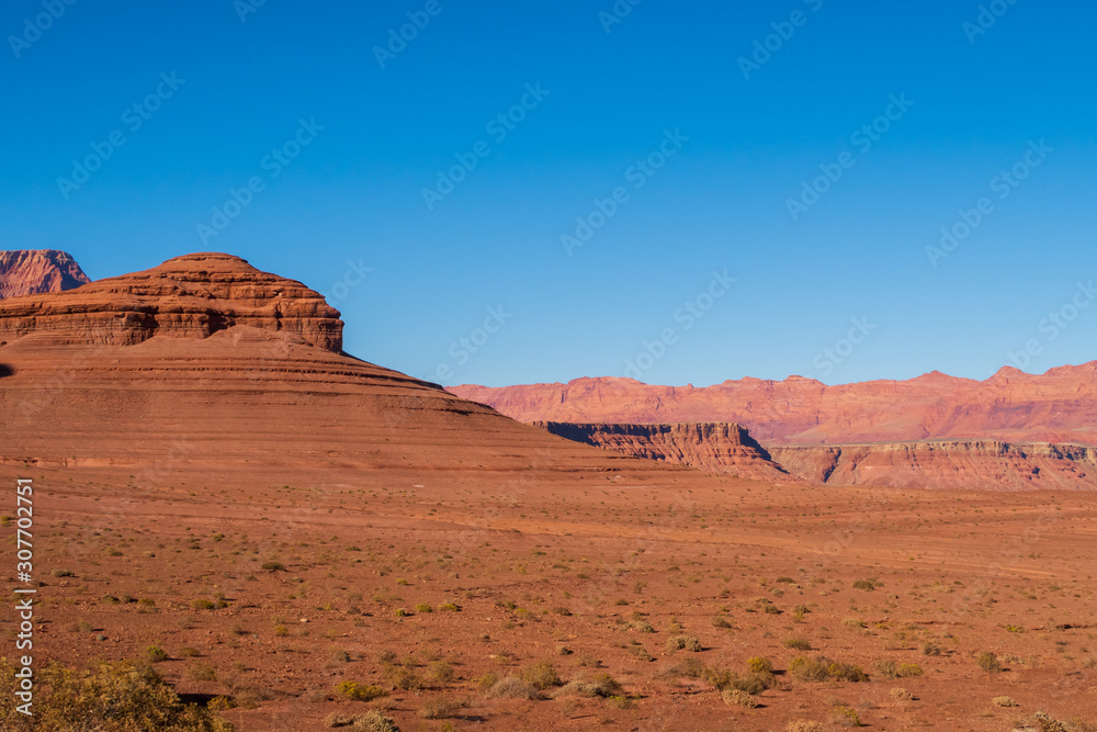 Landscape of barren red hillside and terrain at Marble Canyon in Glen Canyon National Recreation Area in Arizona Landscape of barren red hillside and terrain at Marble Canyon in Glen Canyon National Recreation Area in Arizona