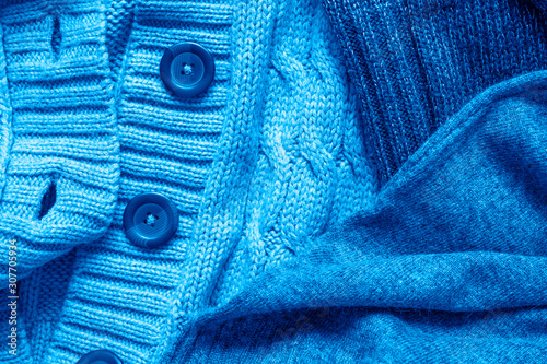 background of knitted sweaters in classic blue shades. color 2020