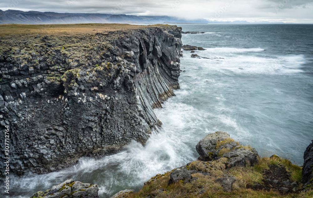 basaltic columns near Arnastapi at the wild rocky coast of Snaefellsness peninsula in western Iceland