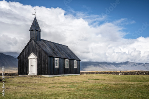 lonly black church of Budir und the south coast of Snaefellsness peninsula in western Iceland